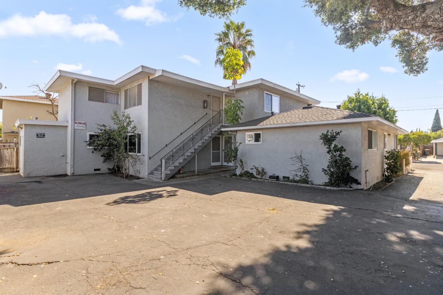 617 Bryan Avenue Sunnyvale, CA 94086 - Photo 16 of 16 a view of a white house with a yard