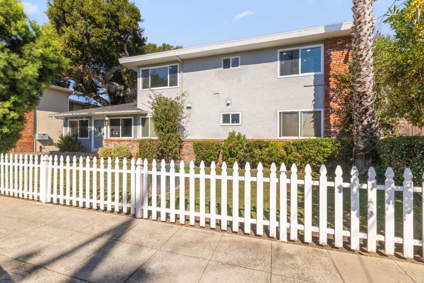 617 Bryan Avenue Sunnyvale, CA 94086 - Photo 2 of 16 a front view of white house with a small yard