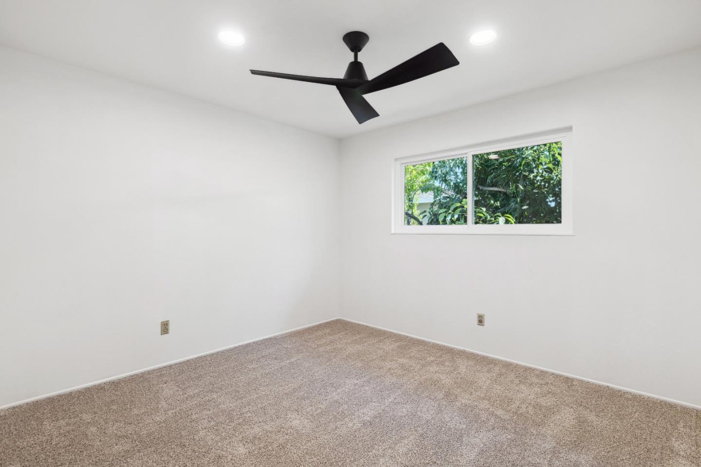617 Bryan Avenue Sunnyvale, CA 94086 - Photo 8 of 16 an empty room with a window