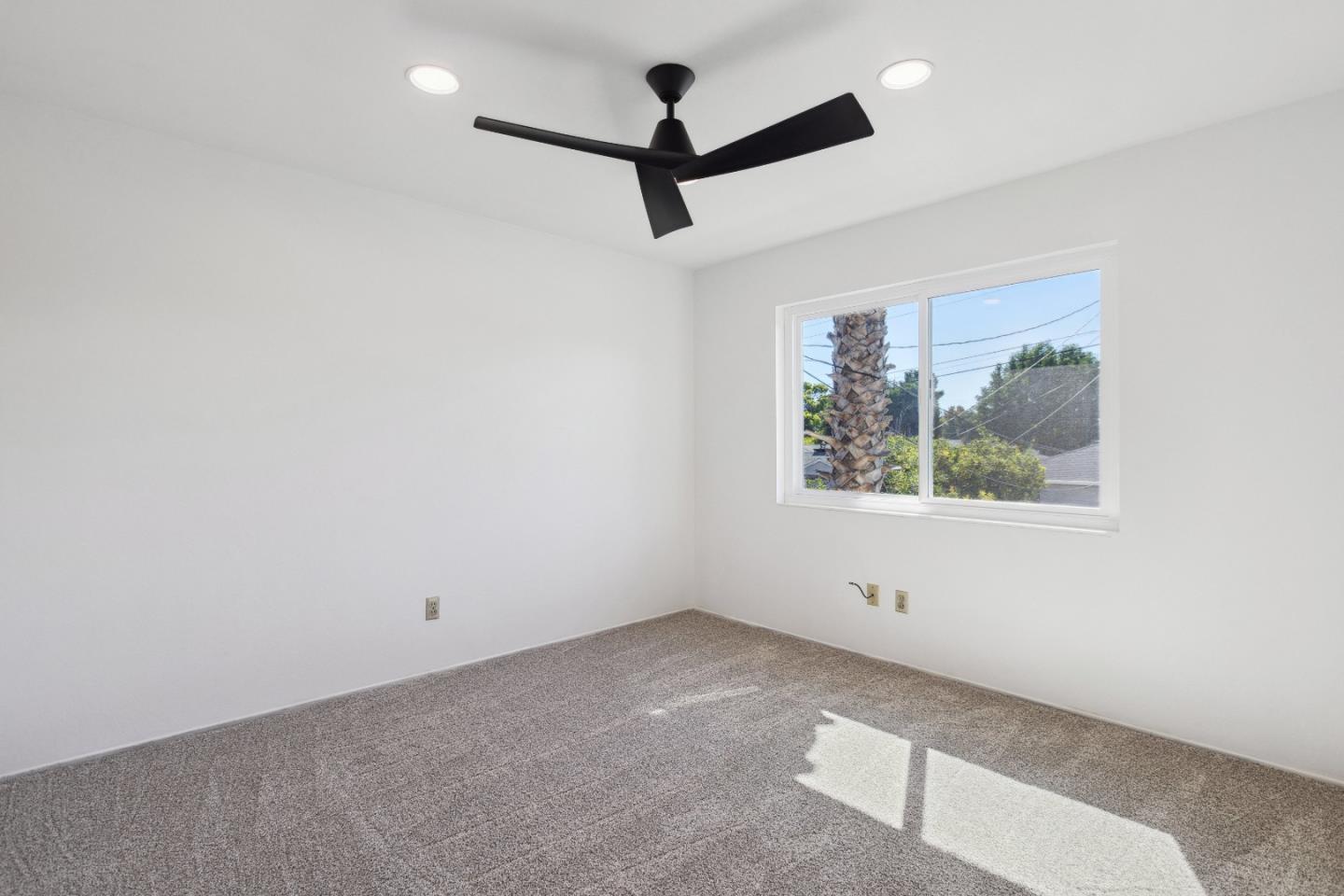617 Bryan Avenue Sunnyvale, CA 94086 - Photo 10 of 16 an empty room with a window