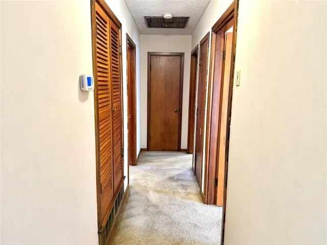 a view of a room with a large window