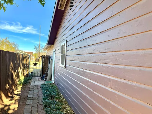 a view of a back yard of the house