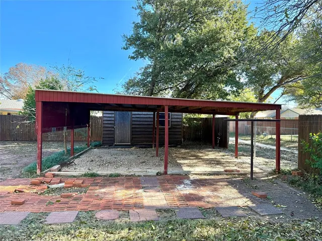 a view of a house with backyard from a ceiling window