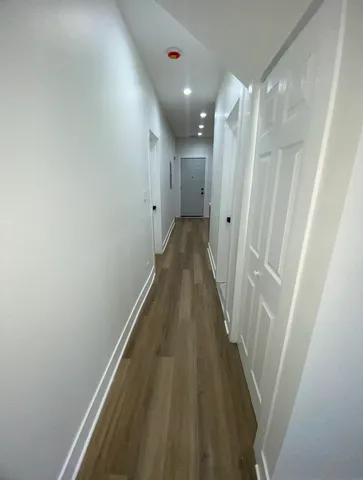 a kitchen that has a sink and a stove in it