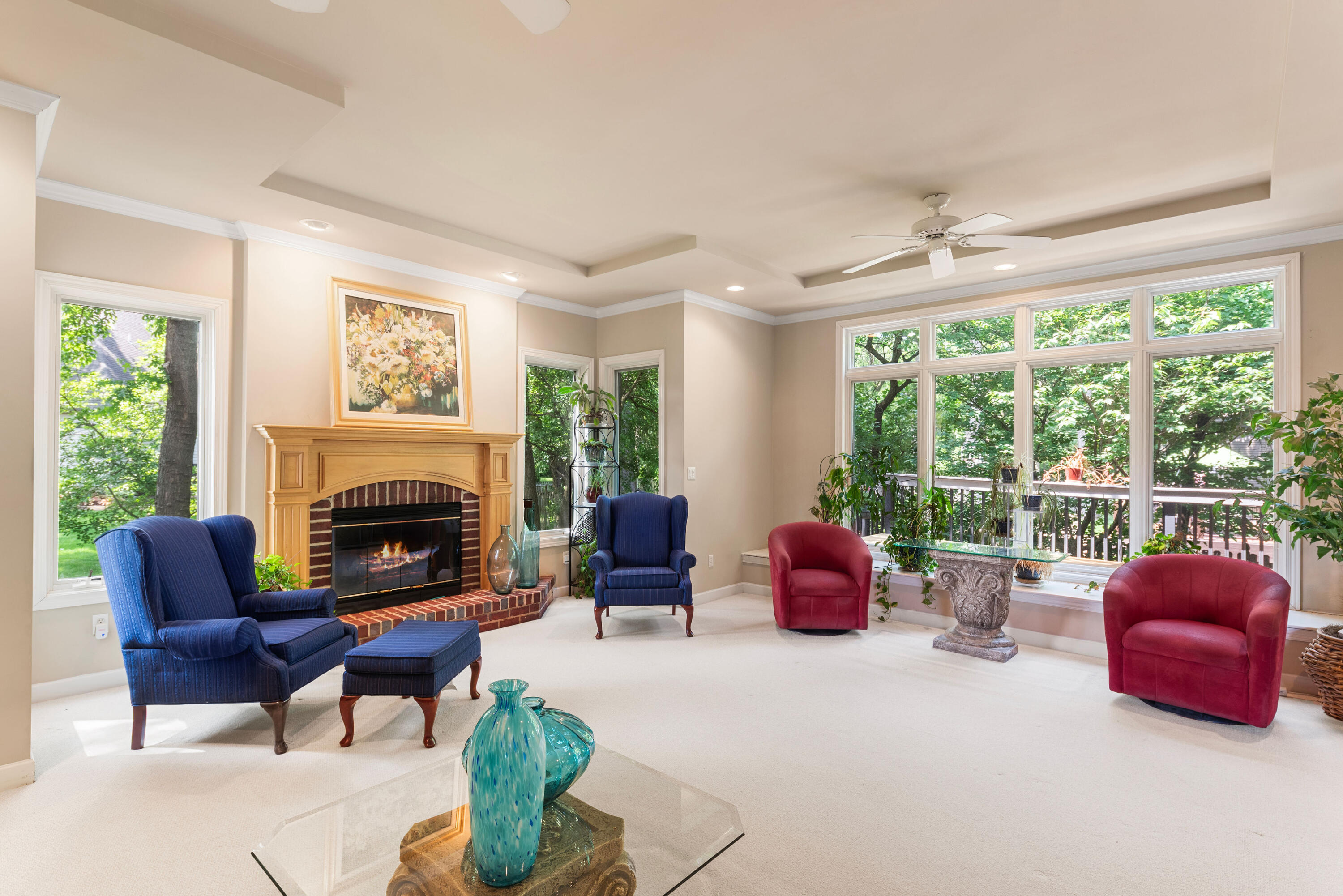 7412 Forest Ridge Drive Schererville, IN 46375 - Photo 13 of 60 a living room with furniture and a fireplace