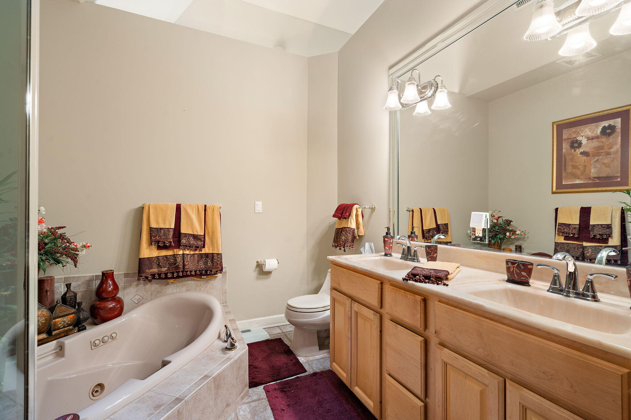 7412 Forest Ridge Drive Schererville, IN 46375 - Photo 32 of 60 a bathroom with a sink double vanity granite and a toilet