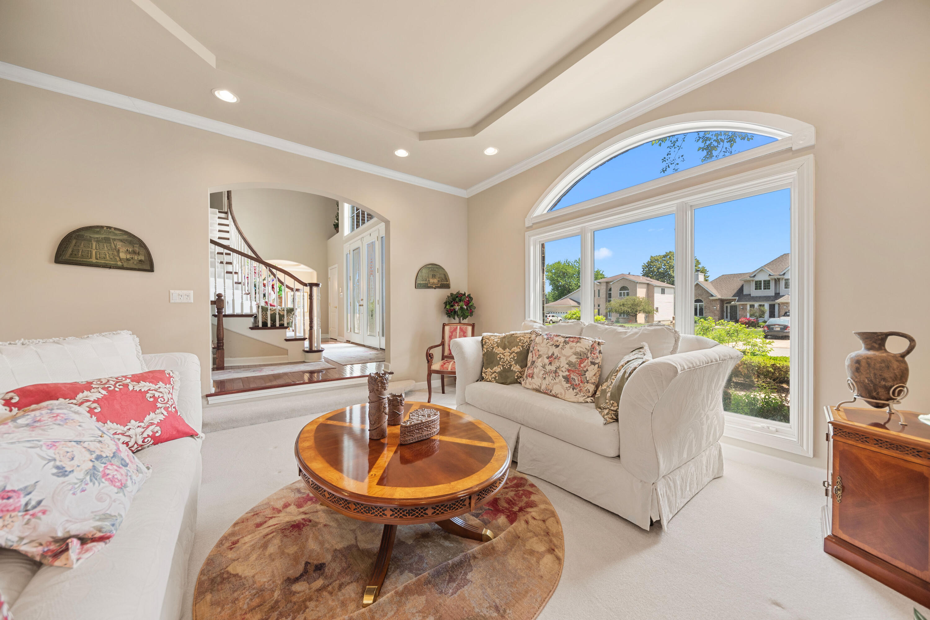 7412 Forest Ridge Drive Schererville, IN 46375 - Photo 8 of 60 a living room with furniture and a fireplace