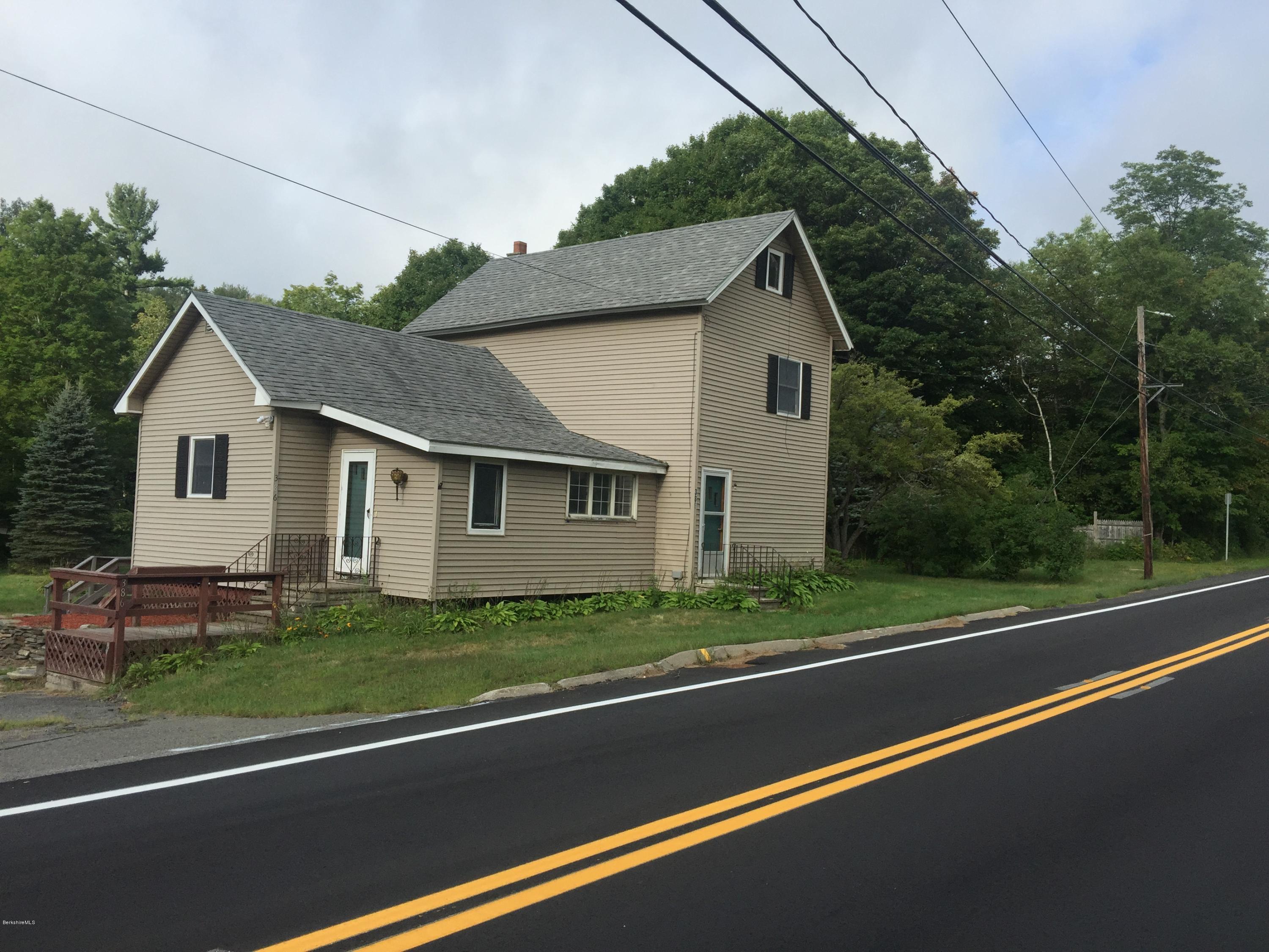 386 South Washington State Road Washington, MA 01223 - Photo 1 of 15 a front view of a house with a yard