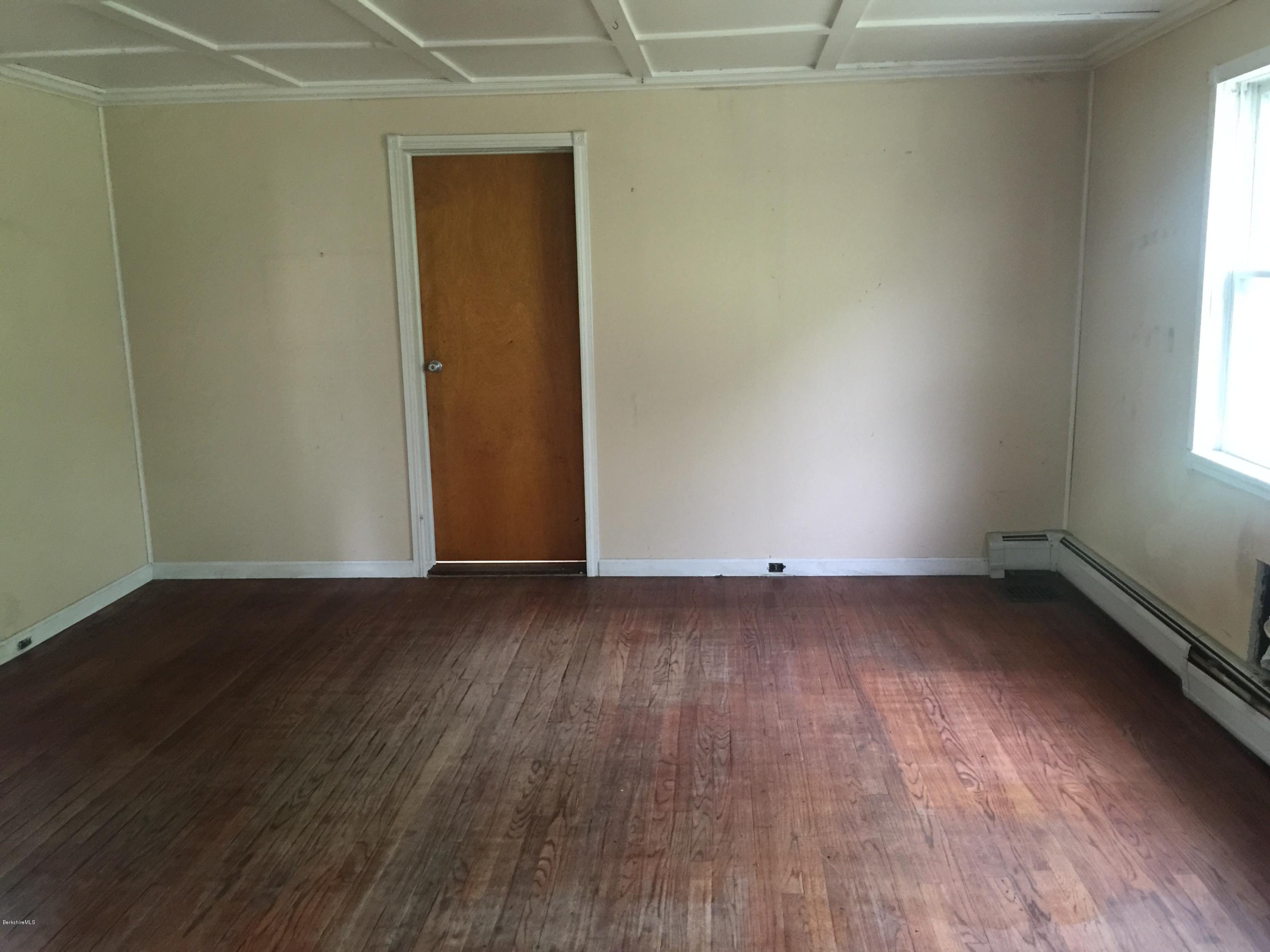 386 South Washington State Road Washington, MA 01223 - Photo 8 of 15 an empty room with wooden floor and windows