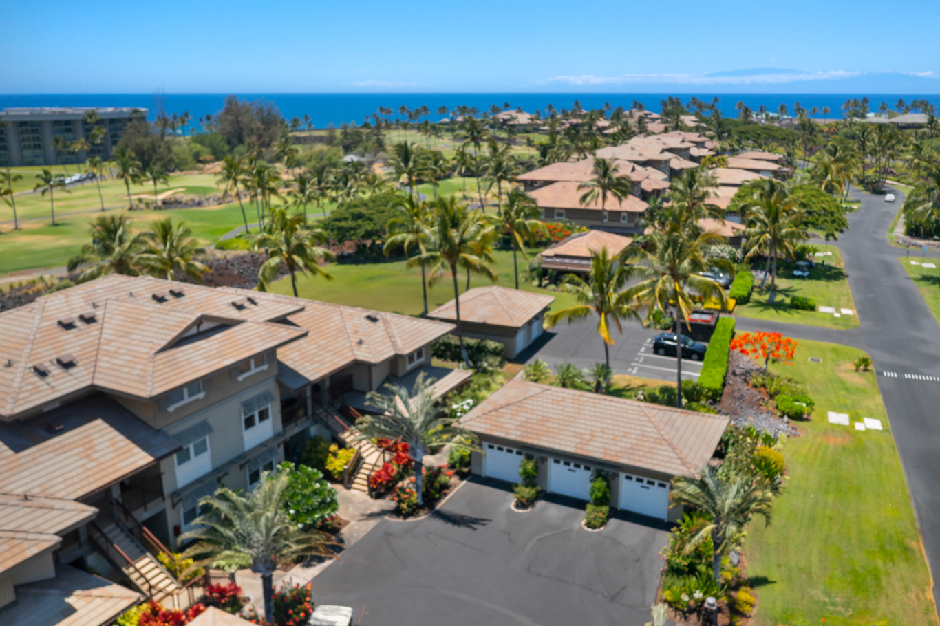 an aerial view of a house with a garden