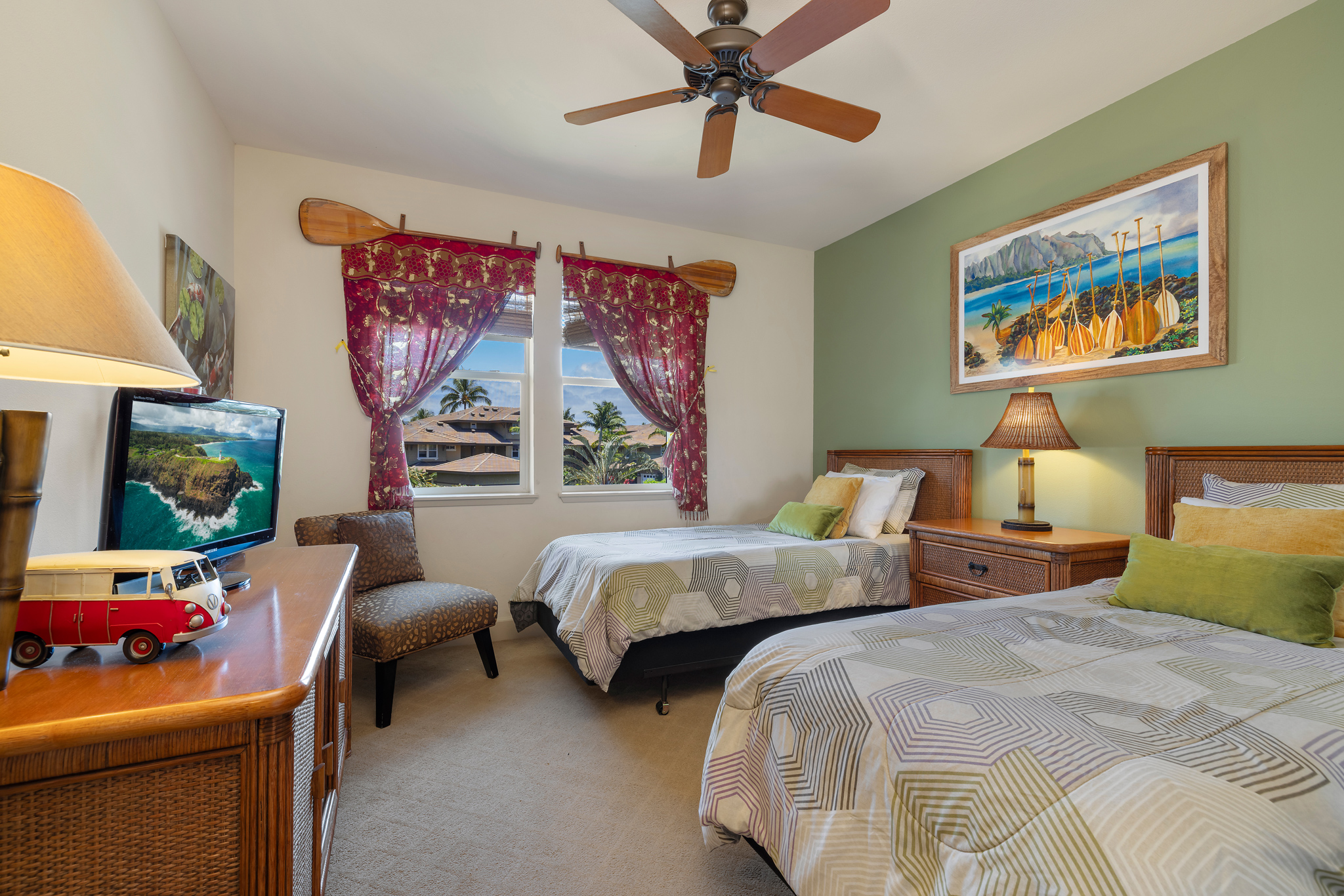 69-1033 Nawahine Place, Unit 4G Waikoloa, HI 96738 - Photo 14 of 26 a bedroom with two beds and a painting on the wall