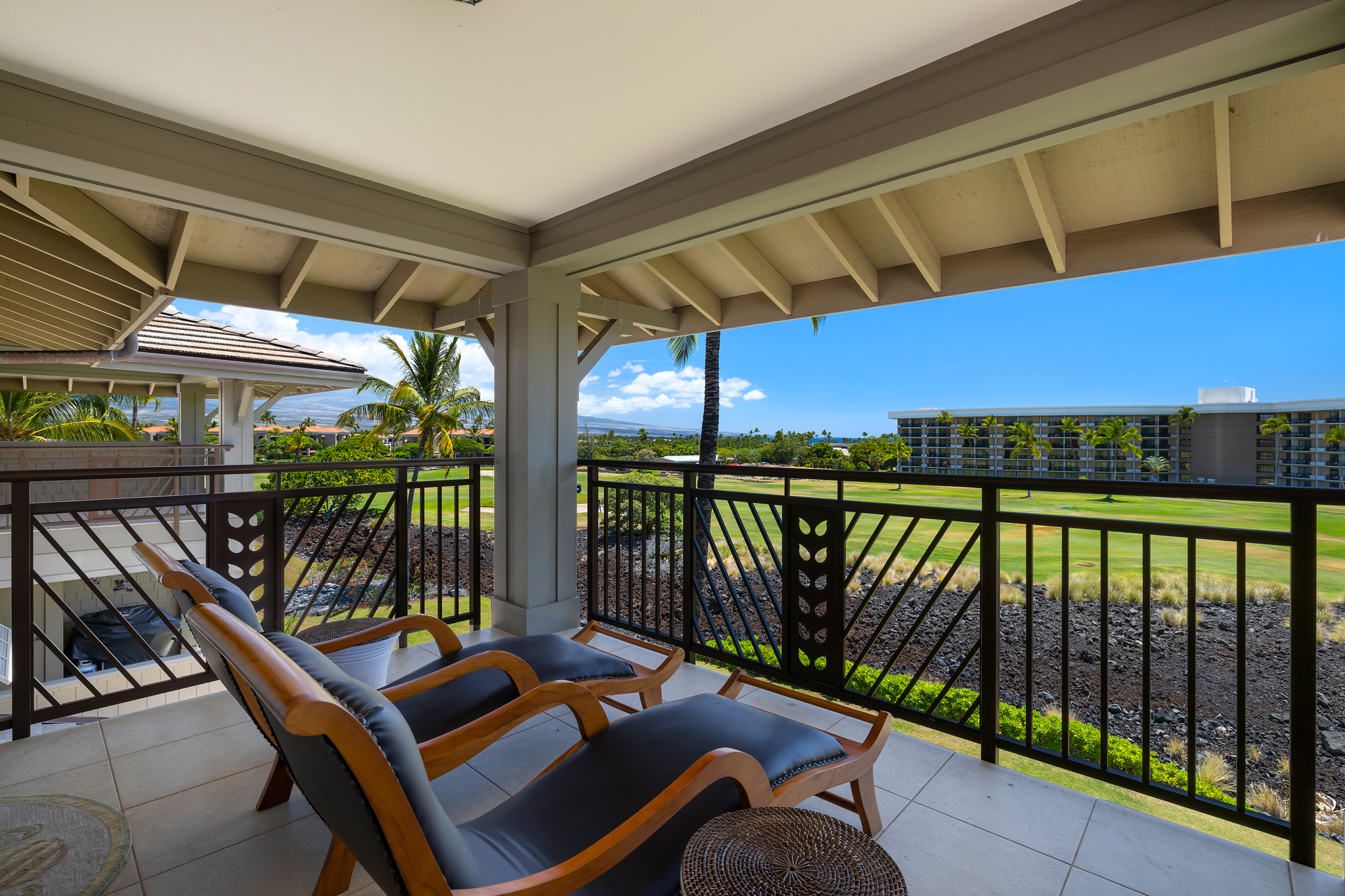 69-1033 Nawahine Place, Unit 4G Waikoloa, HI 96738 - Photo 21 of 26 a balcony with furniture and outdoor view