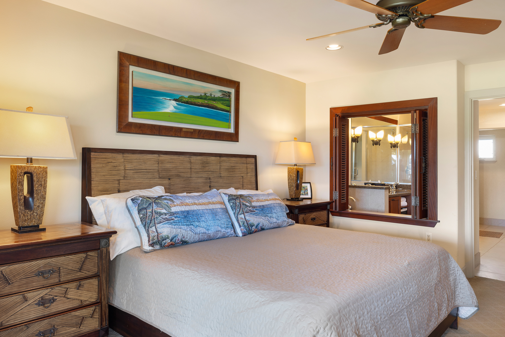 69-1033 Nawahine Place, Unit 4G Waikoloa, HI 96738 - Photo 4 of 26 a bedroom with a bed and a painting on the wall