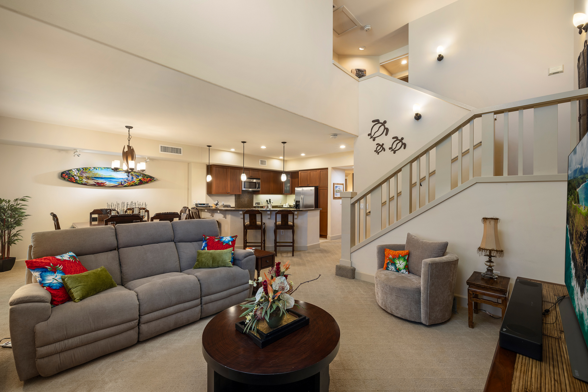 69-1033 Nawahine Place, Unit 4G Waikoloa, HI 96738 - Photo 6 of 26 a living room with furniture and a chandelier