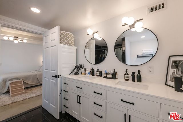 a view of a garage with rack and bicycle