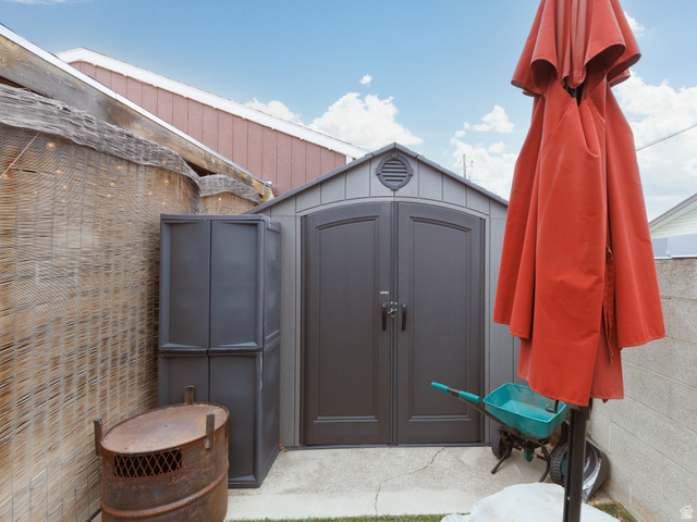 8252 Wood Street Midvale, UT 84047 - Photo 29 of 40 Outdoor storage shed and area.