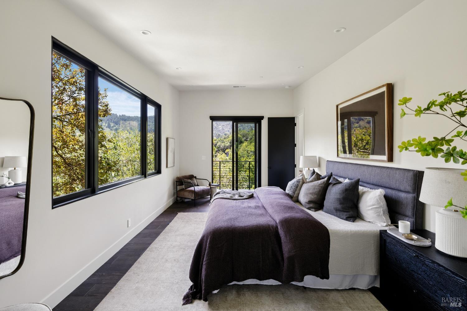 56 Millard Road Larkspur, CA 94939 - Photo 32 of 74 a bedroom with a large bed and a large window