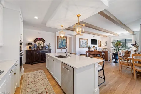 a view of a living room and dining room
