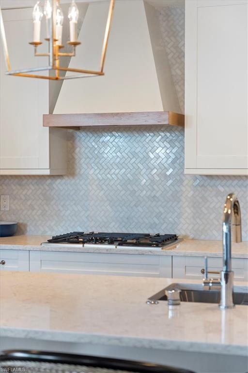 1135 3rd Avenue South, Unit 409 Naples, FL 34102 - Photo 17 of 44 a close view of sink and tap