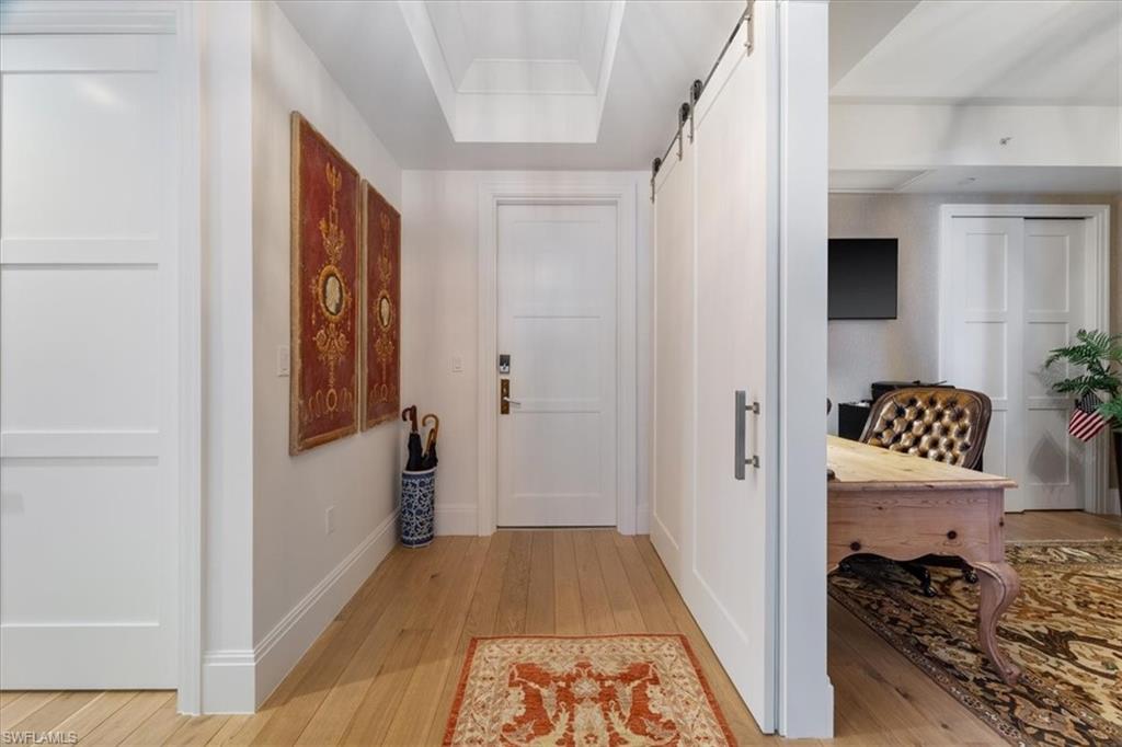 1135 3rd Avenue South, Unit 409 Naples, FL 34102 - Photo 3 of 44 a bathroom with a sink and a window