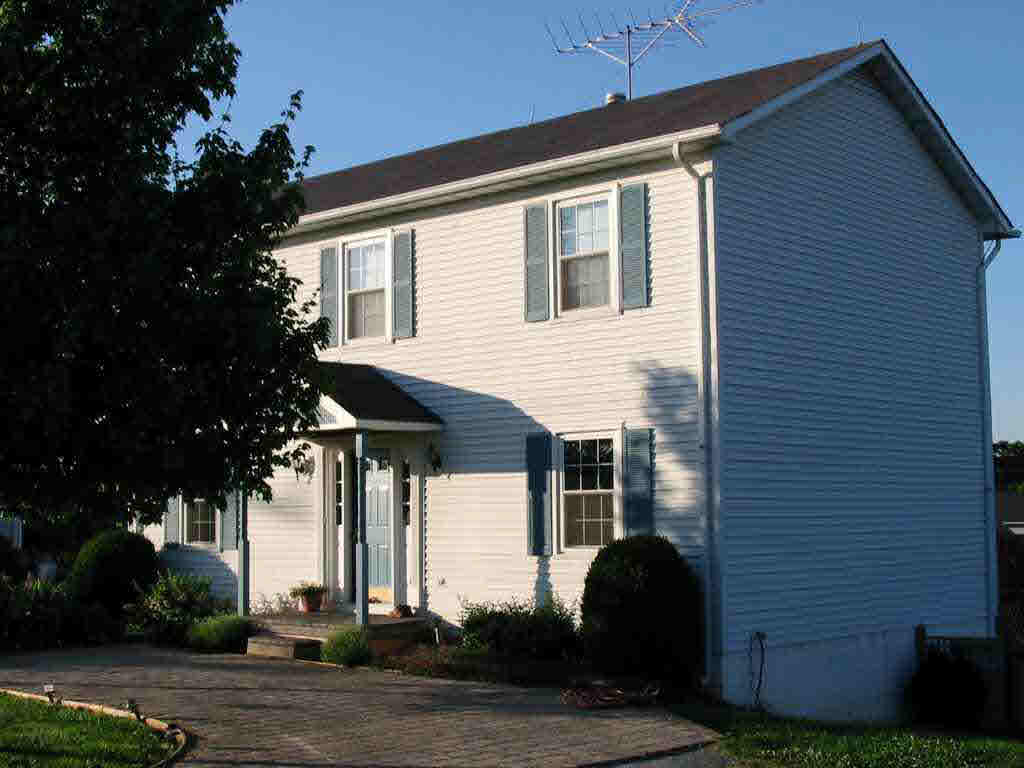 860 Cedar Grove Road Ruckersville, VA 22968 - Photo 4 of 4 a front view of a house with garden