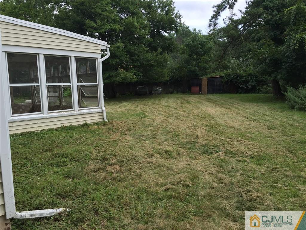 27 Richard Road Edison, NJ 08820 - Photo 1 of 5 a view of a backyard