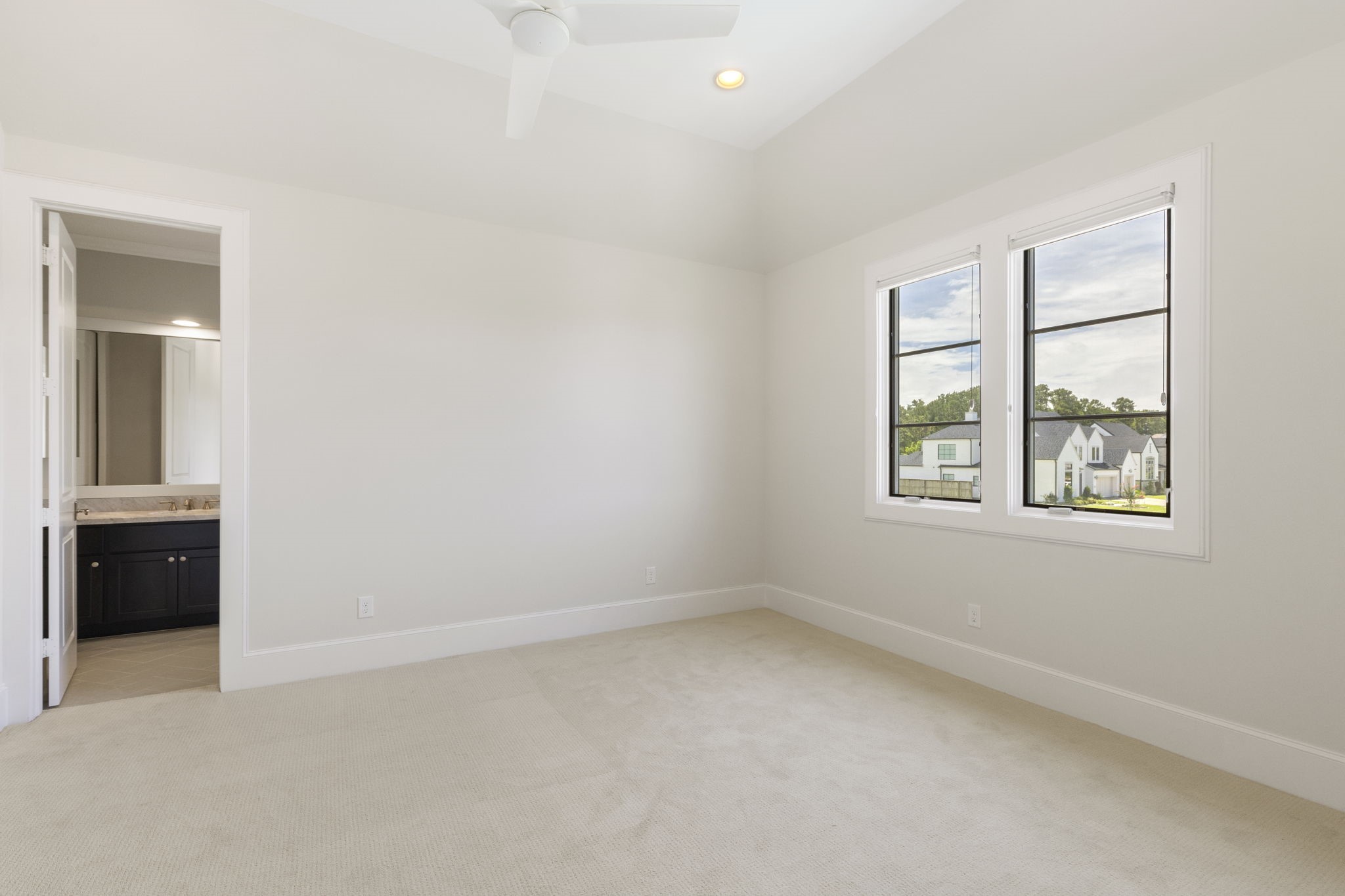 6806 West Warwick Lake Lane Spring, TX 77389 - Photo 32 of 50 an empty room with windows and closet
