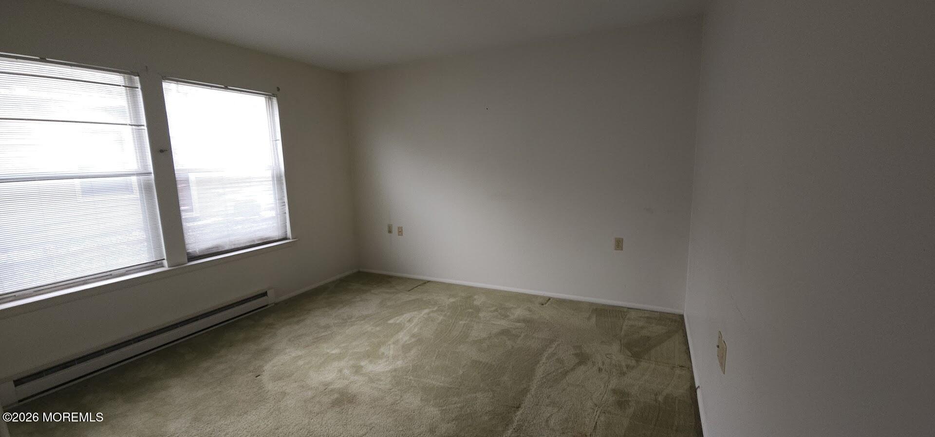 29 Hastings Road Manchester Township, NJ 08759 - Photo 11 of 14 an empty room with windows