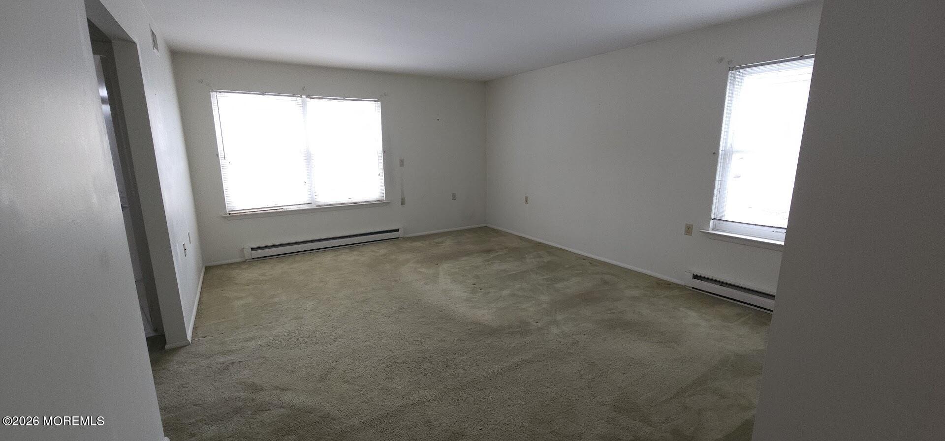 29 Hastings Road Manchester Township, NJ 08759 - Photo 13 of 14 an empty room with a window