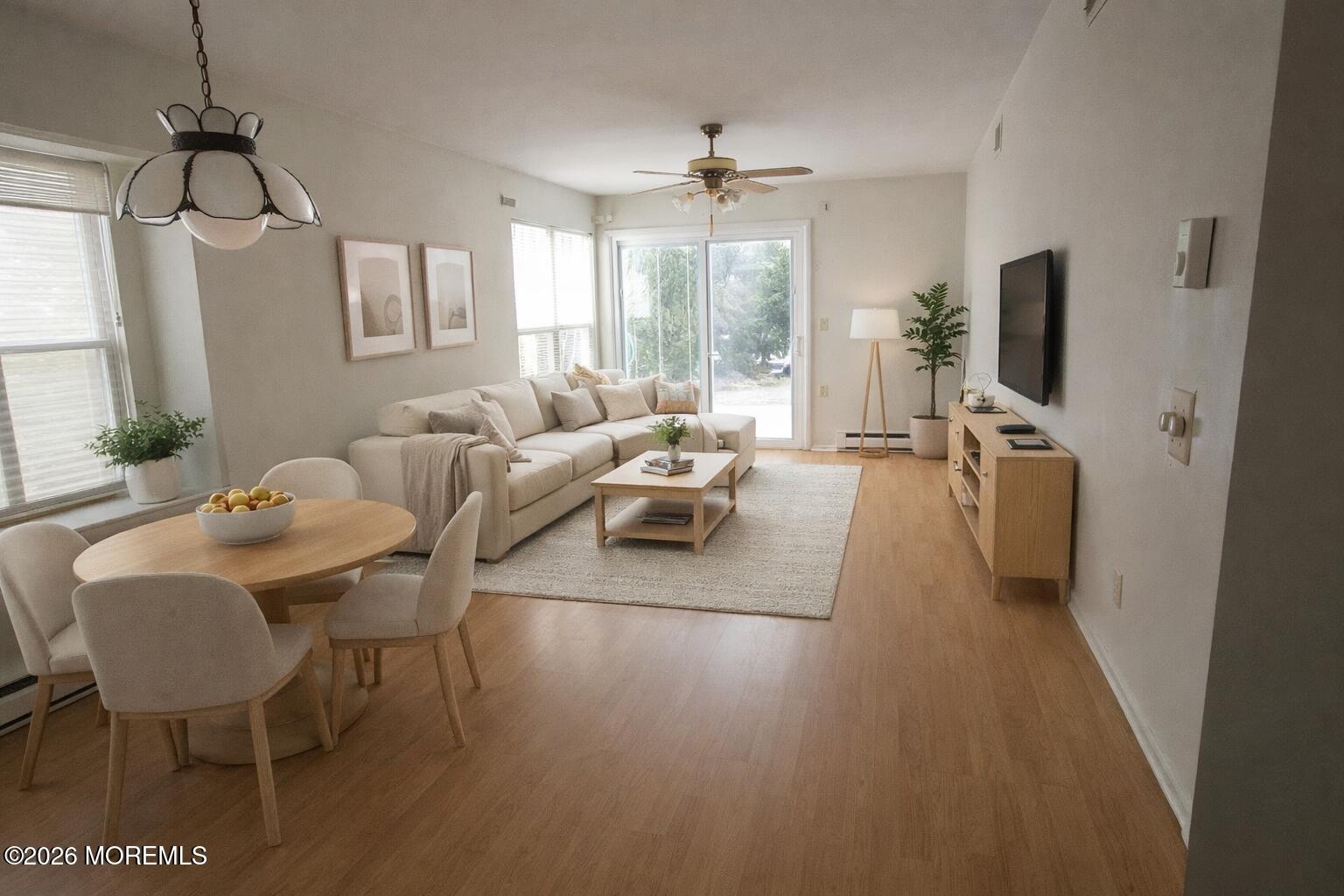 29 Hastings Road Manchester Township, NJ 08759 - Photo 8 of 14 a living room with furniture and a flat screen tv