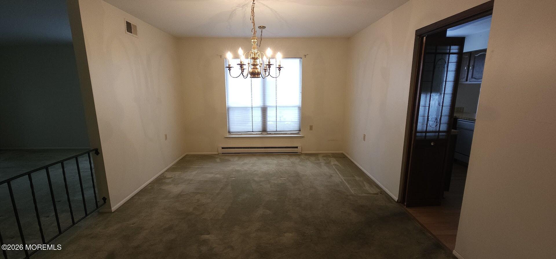 29 Hastings Road Manchester Township, NJ 08759 - Photo 9 of 14 wooden floor in an empty room with a window