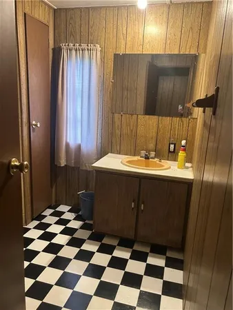 a view of a bathroom with a shower curtain