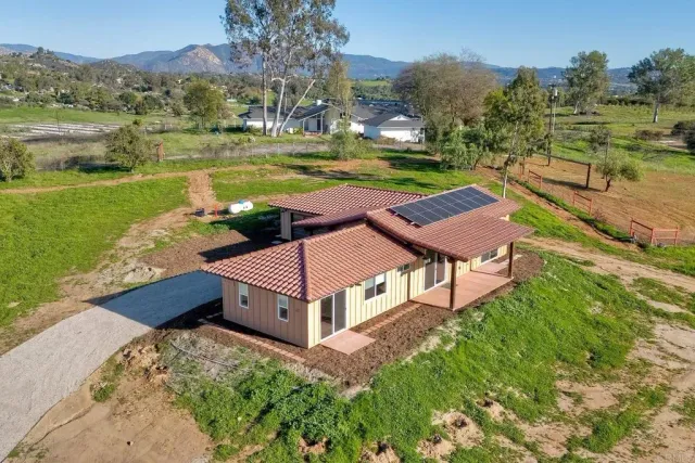 a view of a garden with an ocean