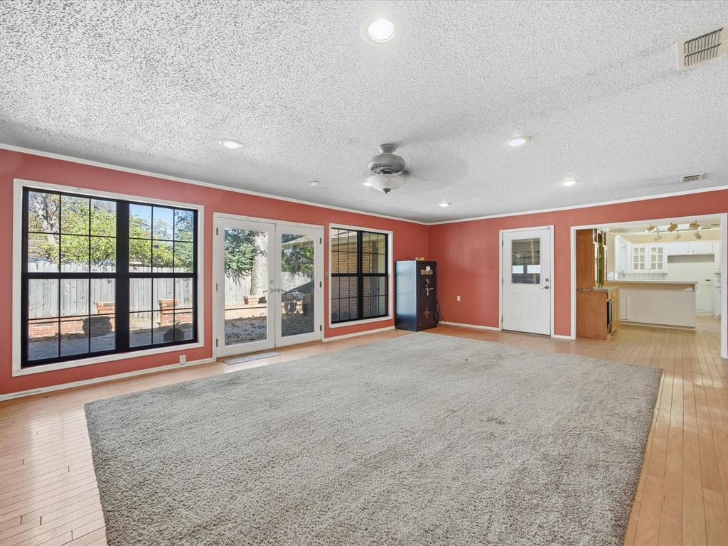 1104 Coffield Street Bowie, TX 76230 - Photo 15 of 39 a view of an empty room with a window