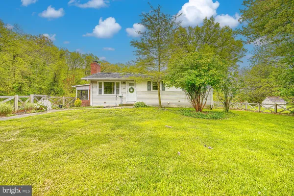 a view of a house with a big yard
