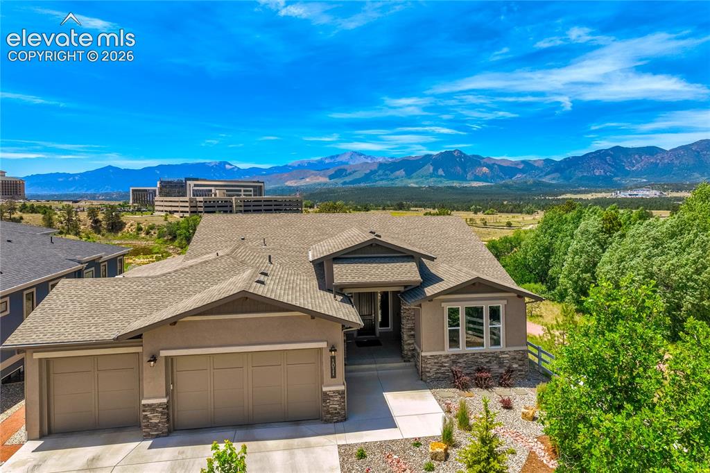 1011 Charismatic Way Colorado Springs, CO 80921 - Photo 1 of 50 Expertly crafted by Saddletree Homes and perfectly positioned at the end of a quiet cul-de-sac backing and siding to open space.