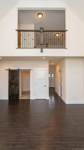 a view of kitchen with furniture and wooden floor