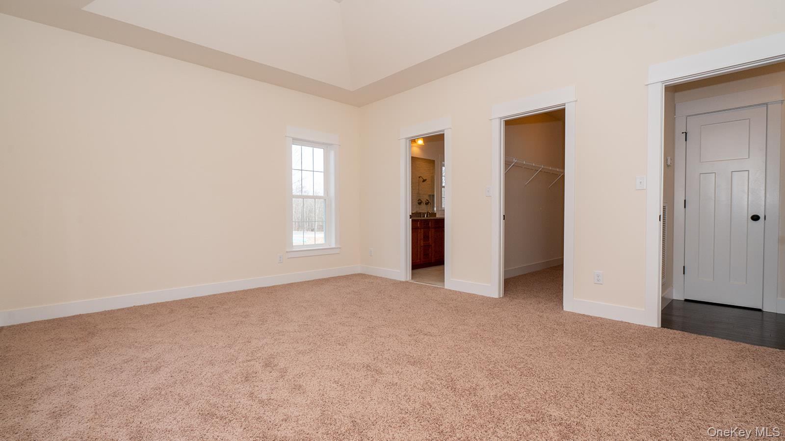 43 Malloy Road Wallkill, NY 12589 - Photo 23 of 50 Unfurnished bedroom featuring carpet flooring, a walk in closet, and connected bathroom