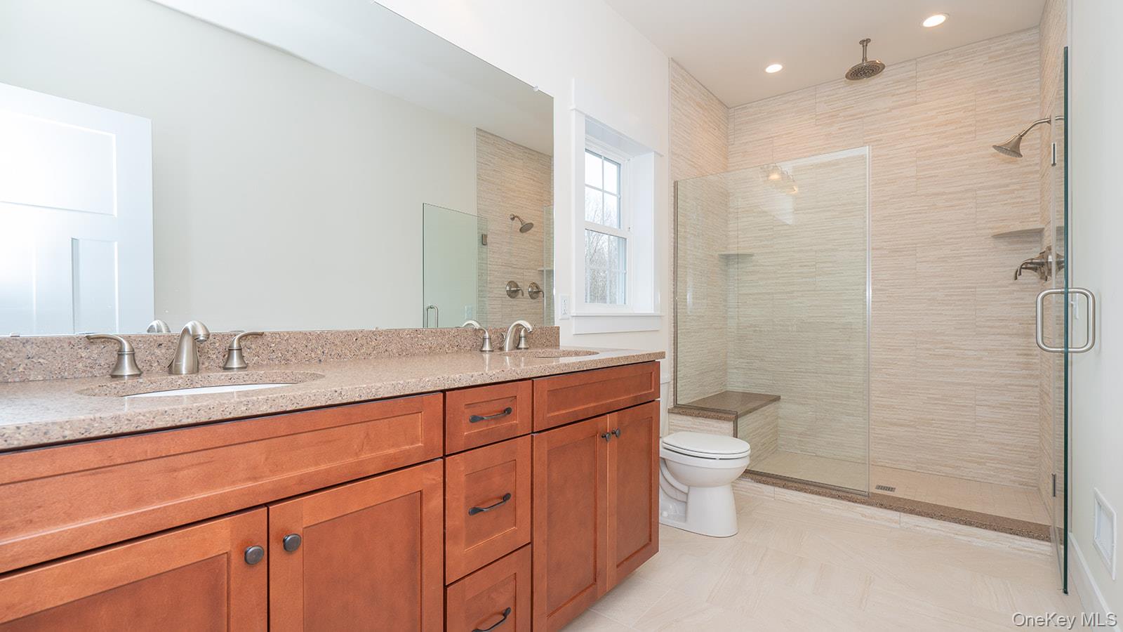 43 Malloy Road Wallkill, NY 12589 - Photo 27 of 50 Full bathroom featuring double vanity, a shower stall, and recessed lighting