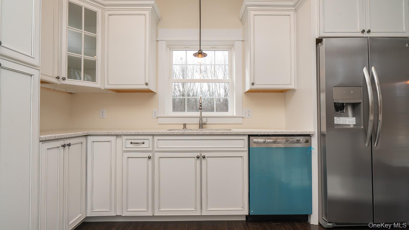 43 Malloy Road Wallkill, NY 12589 - Photo 3 of 50 Kitchen featuring stainless steel refrigerator with ice dispenser, dishwasher, white cabinets, and pendant lighting