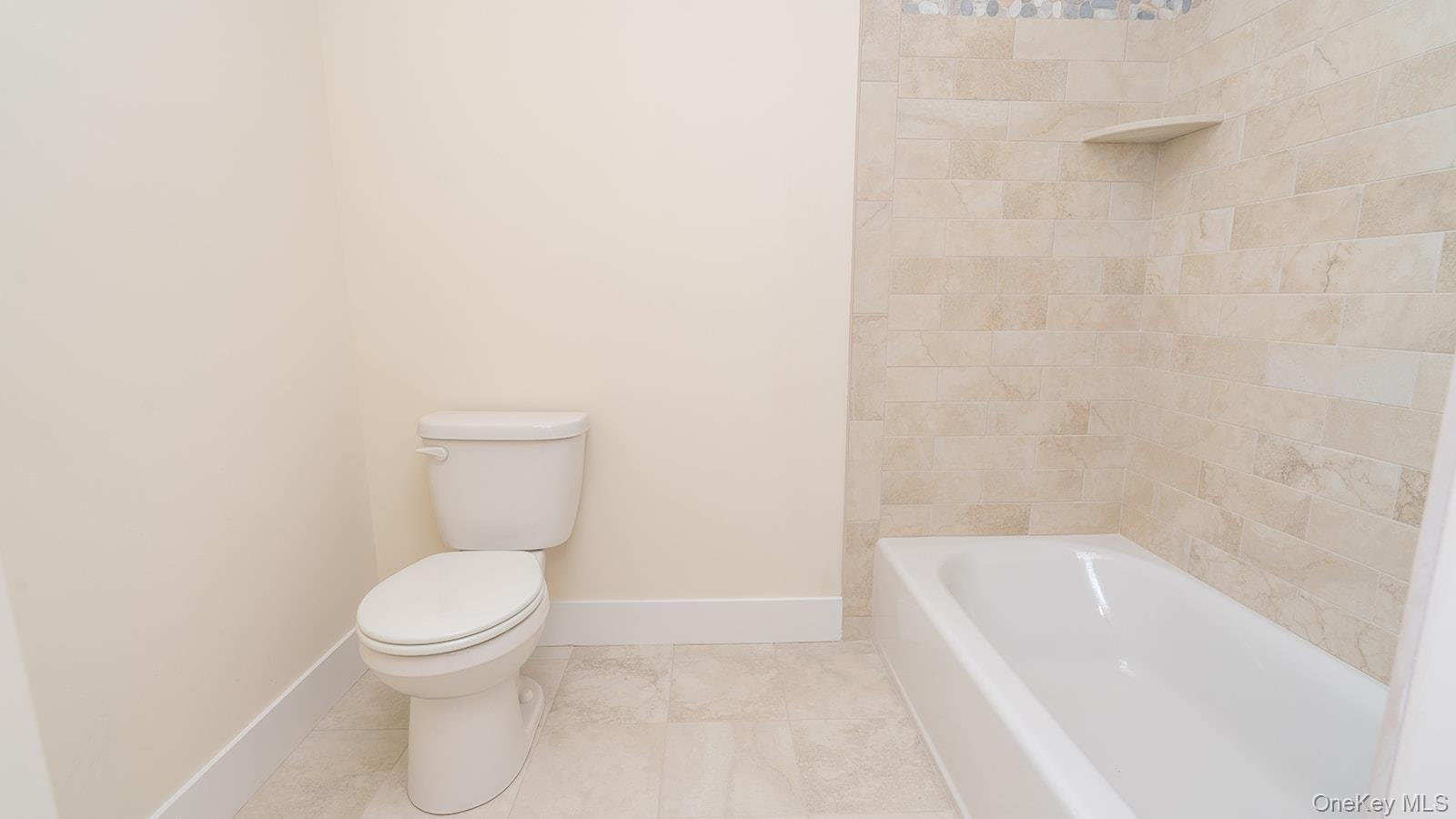 43 Malloy Road Wallkill, NY 12589 - Photo 36 of 50 Full bath featuring shower / tub combination and tile patterned flooring