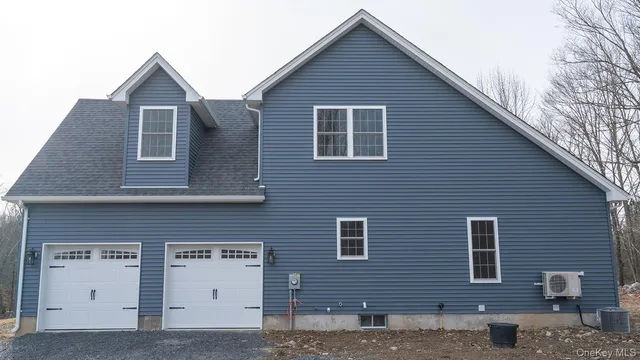 a front view of a house with windows