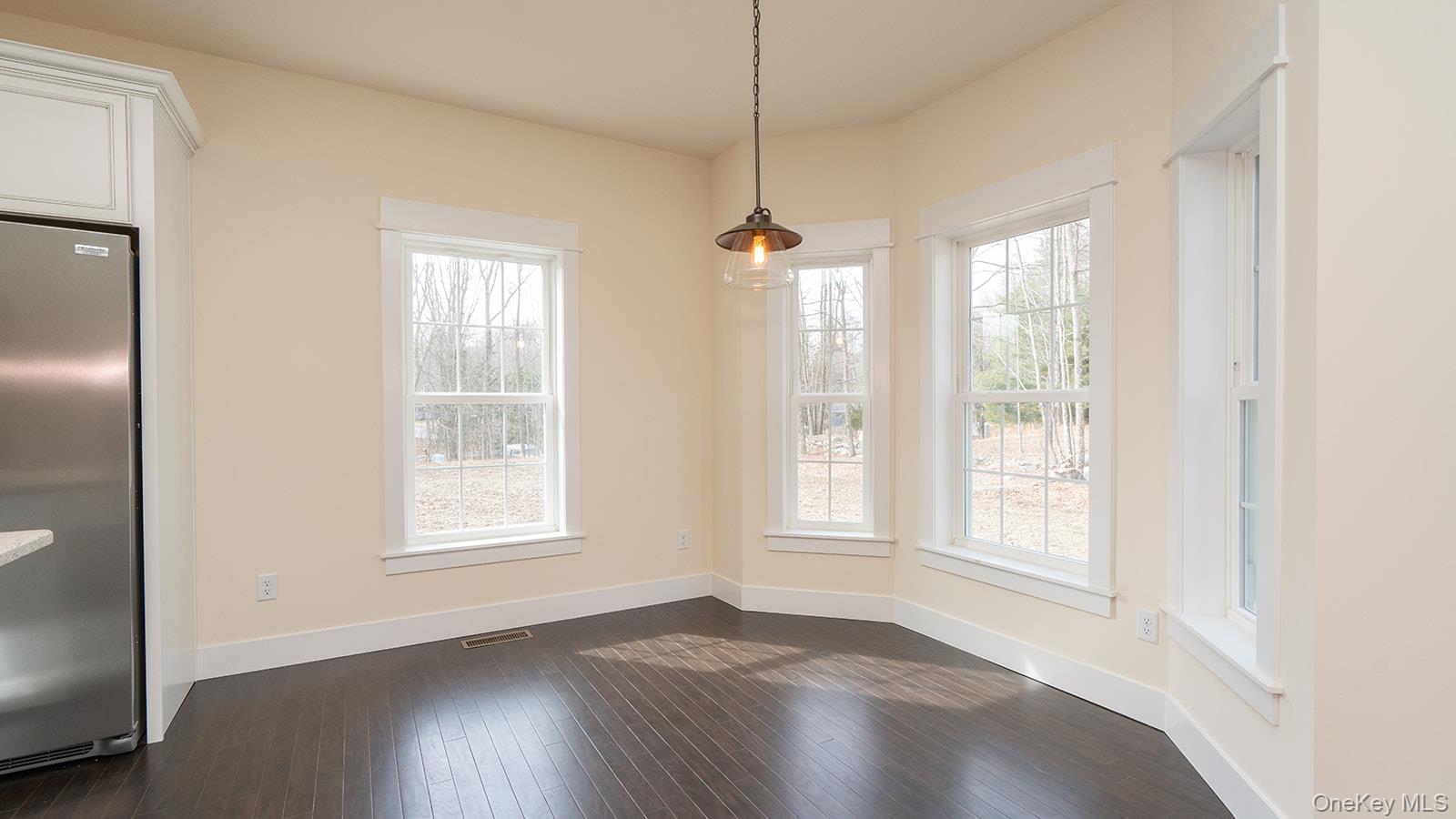43 Malloy Road Wallkill, NY 12589 - Photo 9 of 50 Unfurnished dining area with baseboards and dark wood finished floors
