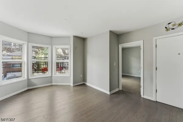 an empty room with windows