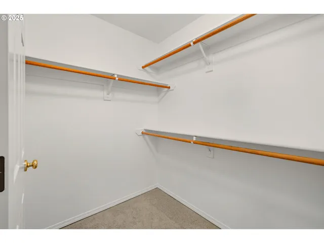 a view of small space with racks on the wall