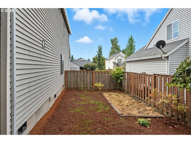 a view of a backyard with a garden