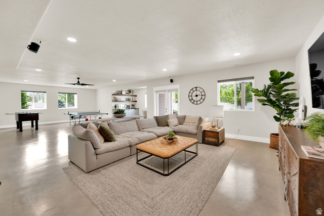 1132 South 1300th Street West Mapleton, UT 84664 - Photo 28 of 52 Expansive open-concept room featuring light-toned walls, recessed lighting, and a contemporary ceiling fan