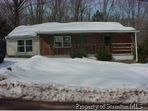 1241 Mountain Road North Shickshinny, PA 18655 - Photo 1 of 1 a front view of a house with a yard