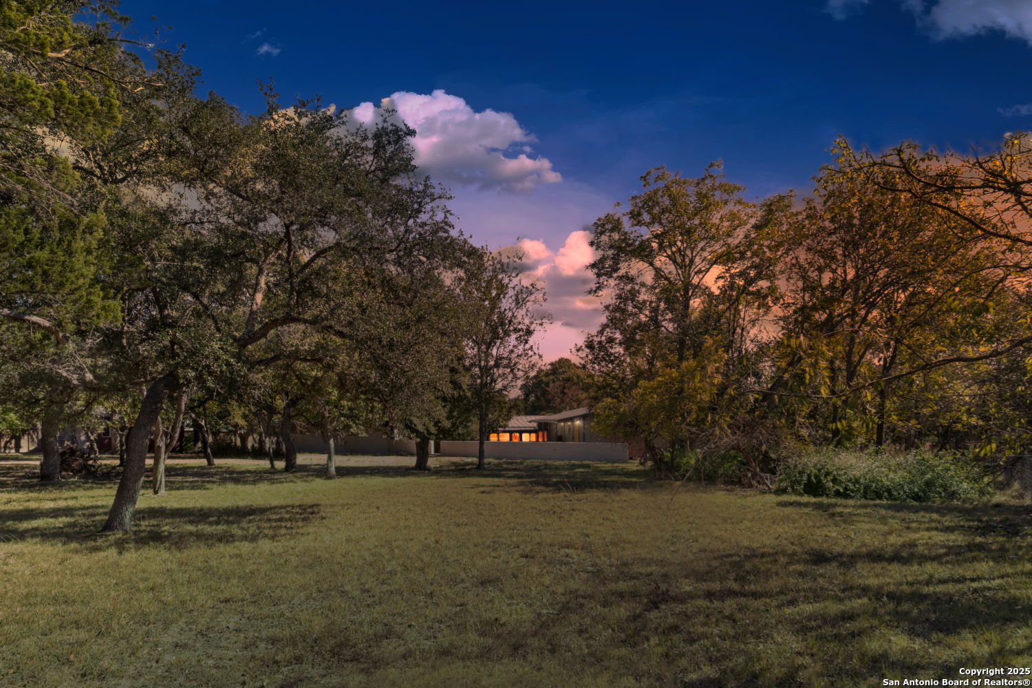 142 Royal Oaks Road Kerrville, TX 78028 - Photo 2 of 17 a view of road with trees