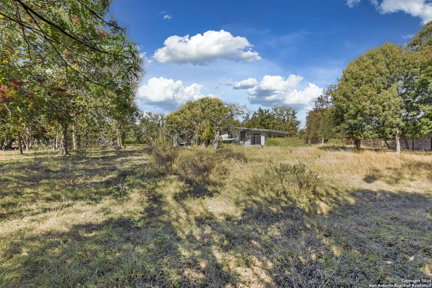 142 Royal Oaks Road Kerrville, TX 78028 - Photo 4 of 17 a view of mountain with sunset
